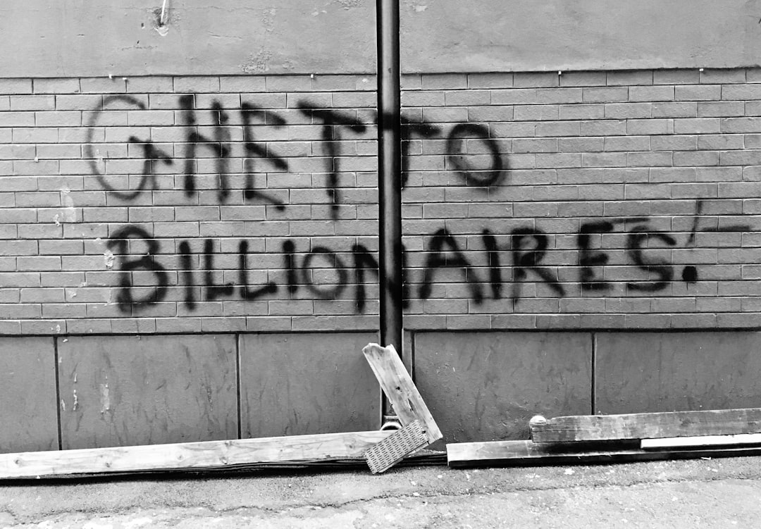 The stark contrast between extreme wealth and everyday struggles fuels the public's perception of the 'March for Billionaires'.